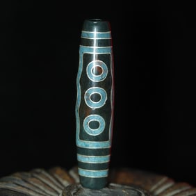 An Exquisite Seven Eyes Dzi Bead Pendant