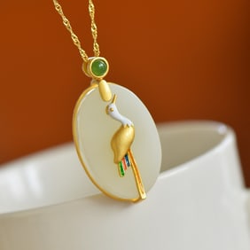 An Exquisite Sterling Silver-Gold Plated Inlaid White Jade Pendant