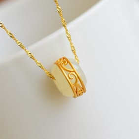 An Exquisite Sterling Silver-Gold Plated Inlaid White Jade Pendant
