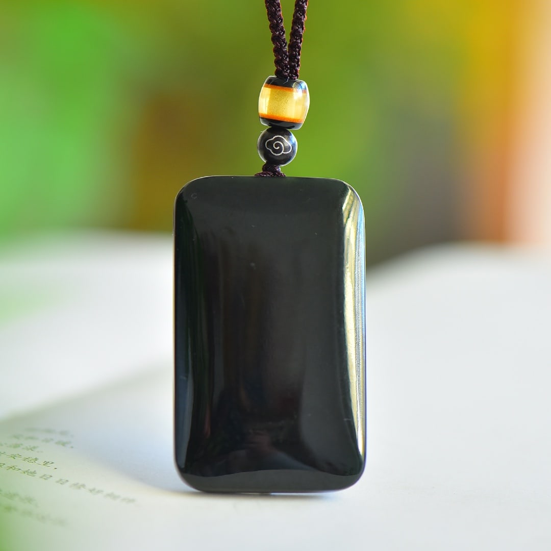 An Exquisite Sapphire Pendant: An Exquisite Sapphire Pendant,Size:30mmx50mmx10mm 青玉吊坠