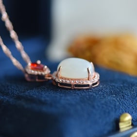 An Exquisite Sterling Silver-Gold Plated Inlaid White Jade Pendant