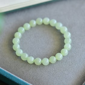 An Exquisite Greenish Jade Bracelets