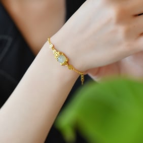 An Exquisite Sterling Silver-Gold Plated Inlaid White Jade Bracelet
