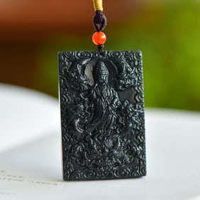 An Exquisite Sapphire Avalokitesvara Pattern Pendant