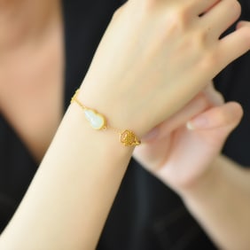 An Exquisite Sterling Silver-Gold Plated Inlaid White Jade Bracelet