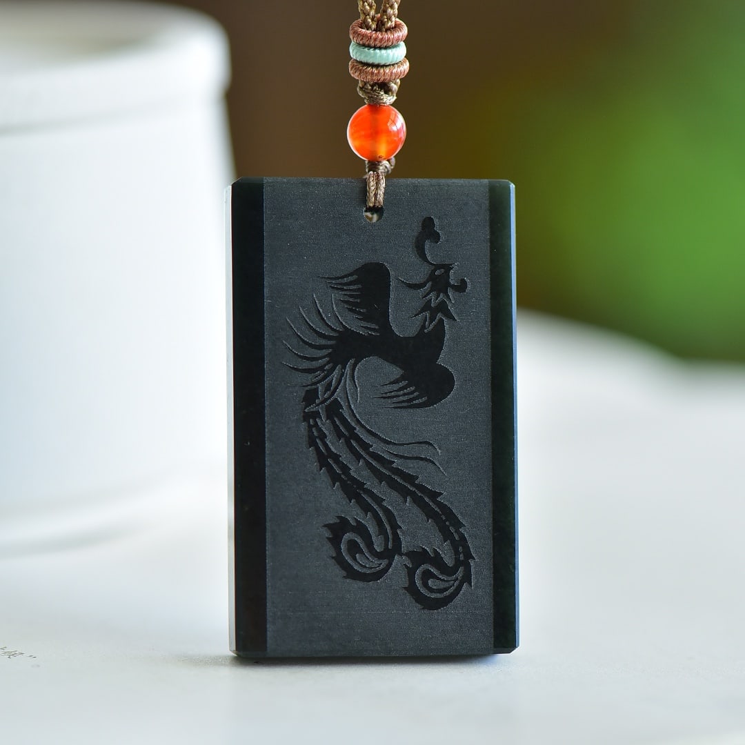 An Exquisite Sapphire Phoenix Pattern Pendant: An Exquisite Sapphire Phoenix Pattern Pendant,Size:50mmx30mmx7mm 