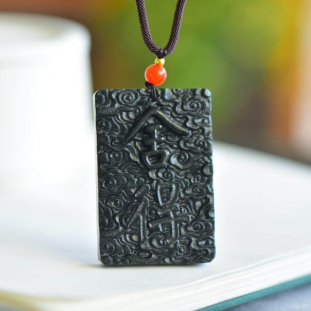 An Exquisite Sapphire Auspicious Cloud Pattern Pendant: An Exquisite Sapphire Auspicious Cloud Pattern Pendant,Size:38mmx56mm 青玉祥云纹吊坠