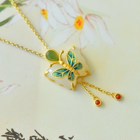 An Exquisite Sterling Silver-Gold Plated Inlaid White Jade Pendant