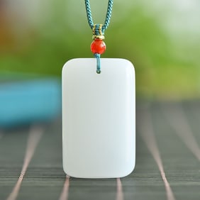 An Exquisite White Jade Pendant
