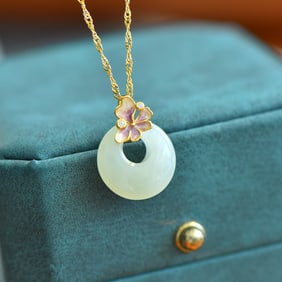 An Exquisite Sterling Silver-Gold Plated Inlaid White Jade Pendant