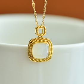 An Exquisite Sterling Silver-Gold Plated Inlaid White Jade Pendant