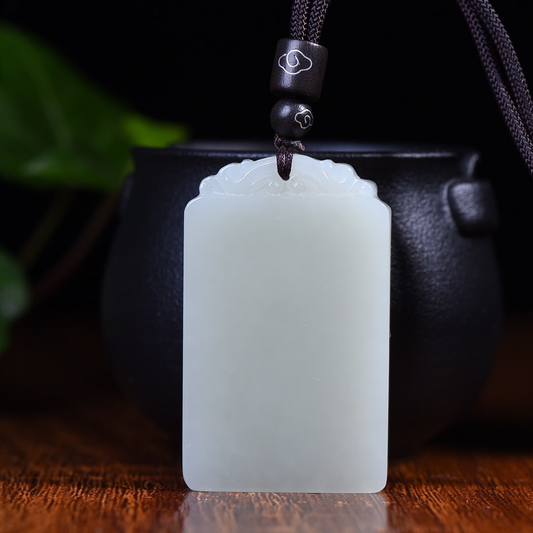 An Exquisite White Jade Pendant: An Exquisite White Jade Pendant,Size:32mmx52mm (寓意)吉祥 保平安 顺风顺水 白玉吊坠