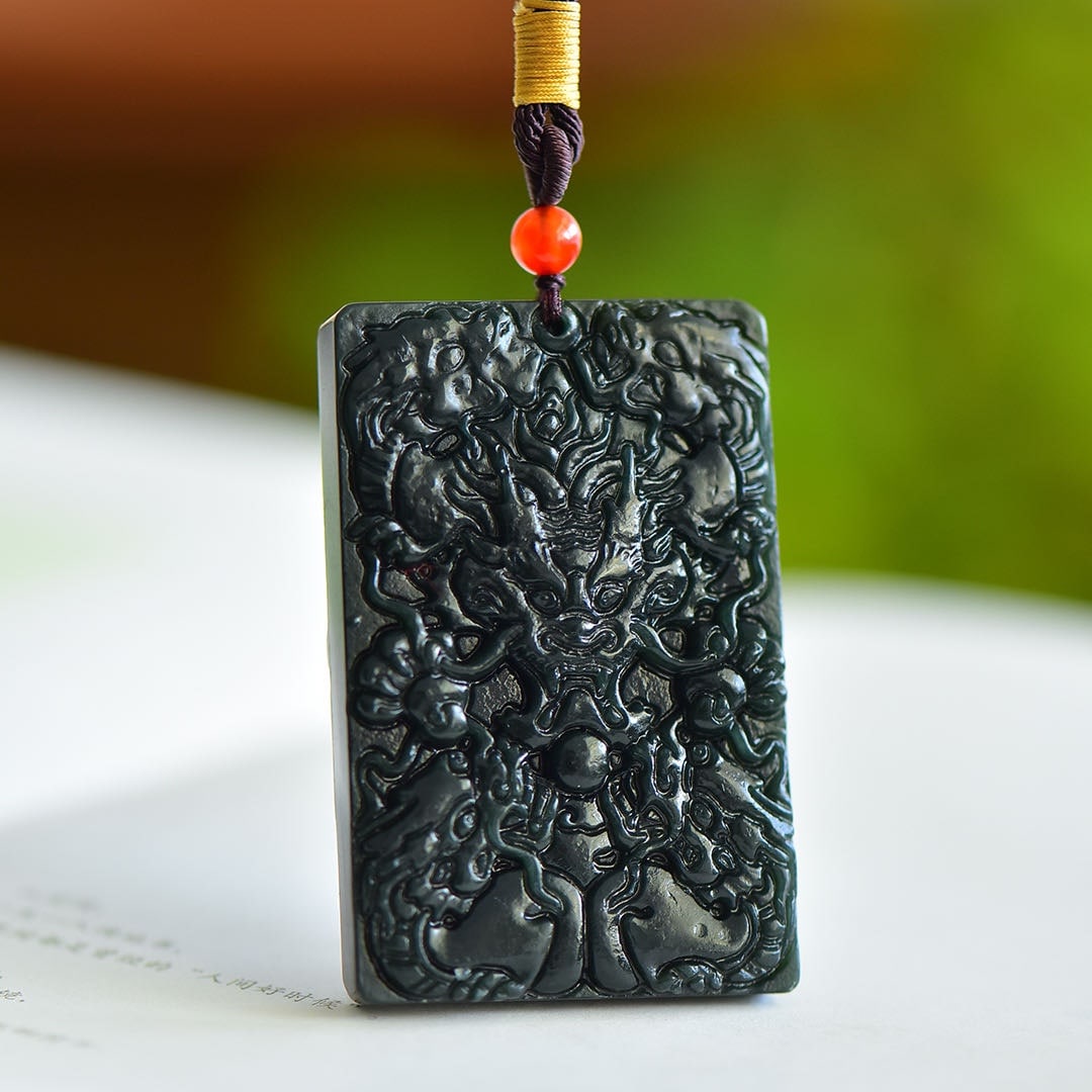 An Exquisite Sapphire Dragon Pattern Pendant: An Exquisite Sapphire Dragon Pattern Pendant,Size:40mmx60mm 