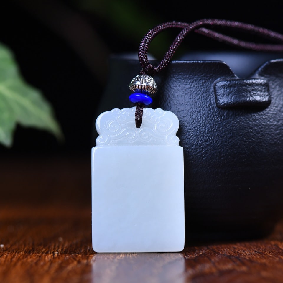 An Exquisite White Jade Pendant: An Exquisite White Jade Pendant,Size:24mmx39mmx5mm (寓意)寓意吉祥 平平安安 白玉吊坠