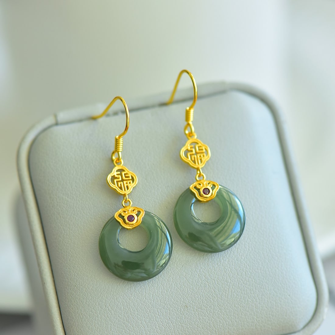 A Pair of Exquisite Sterling Silver-Gold Plated Inlaid Greenish Jade Earrings: A Pair of Exquisite Sterling Silver-Gold Plated Inlaid Greenish Jade Earrings,Size: 15mmx15mm 一对纯银镀金镶青玉耳环