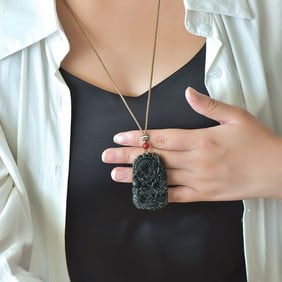 An Exquisite Sapphire Dragon Pattern Pendant