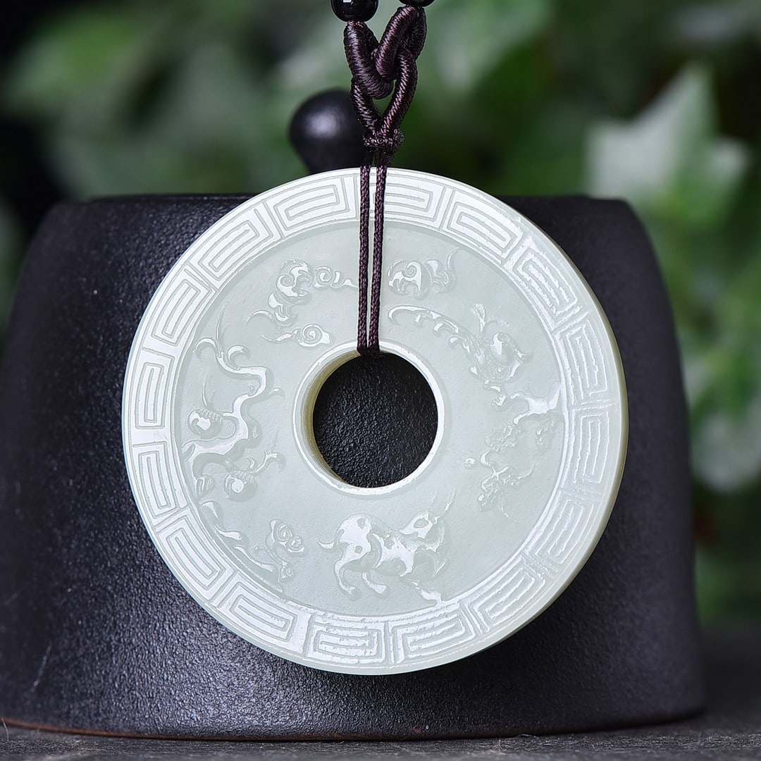 An Exquisite White Jade Eight Treasures Pattern Pendant: An Exquisite White Jade Eight Treasures Pattern Pendant,Size:53mmx53mm (寓意)寓意吉祥,料子白润细腻 