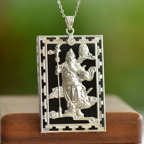 An Exquisite Sterling Silver Inlaid Black Jade Pendant