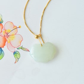 An Exquisite Sterling Silver-Gold Plated Inlaid White Jade Pendant