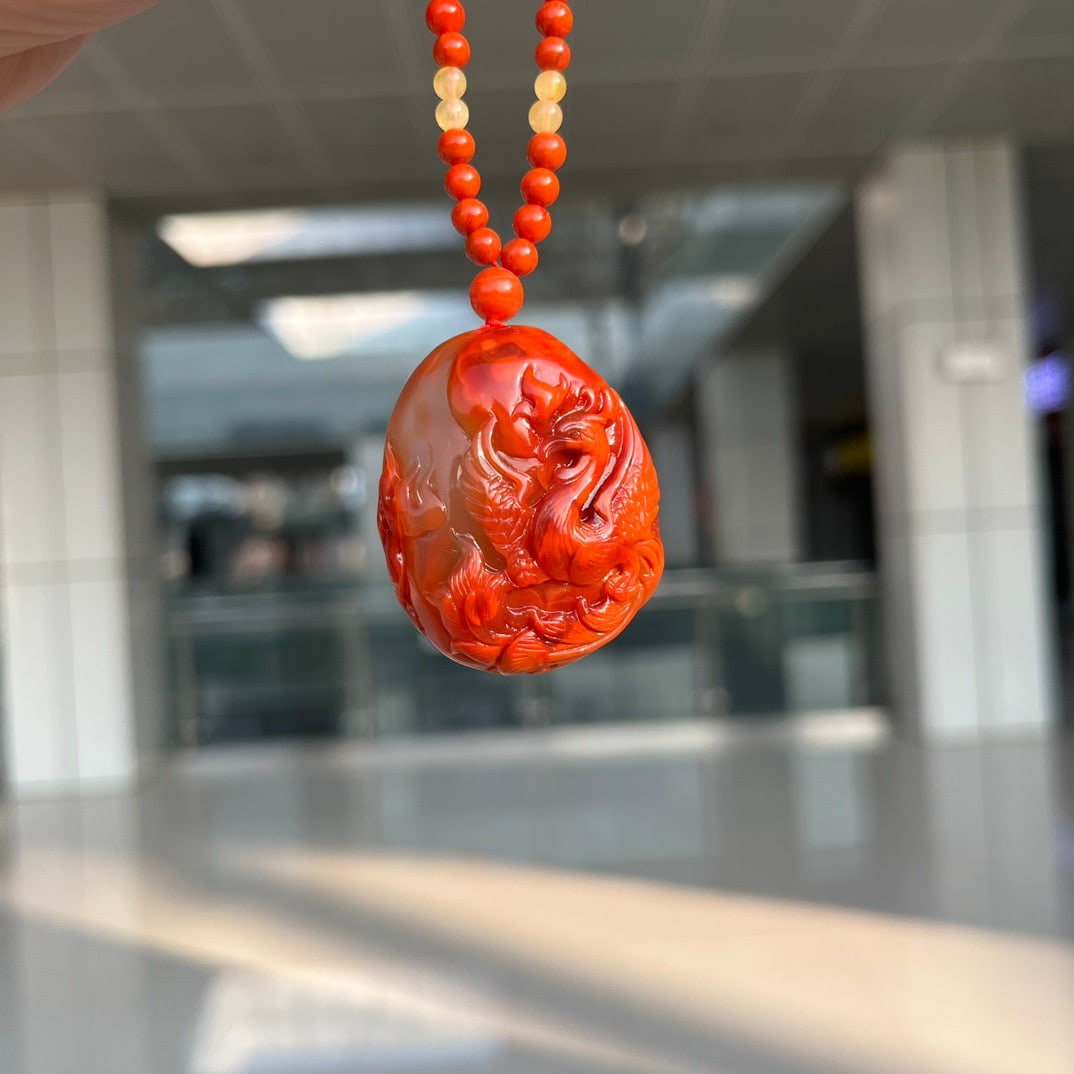 An Exquisite Agate Phoenix Pattern Pendant: An Exquisite Agate Phoenix Pattern Pendant,Size:37.6mmx31mmx15mm,(Necklace)4mm,Total Weight:35.9g 玛瑙凤纹吊坠
