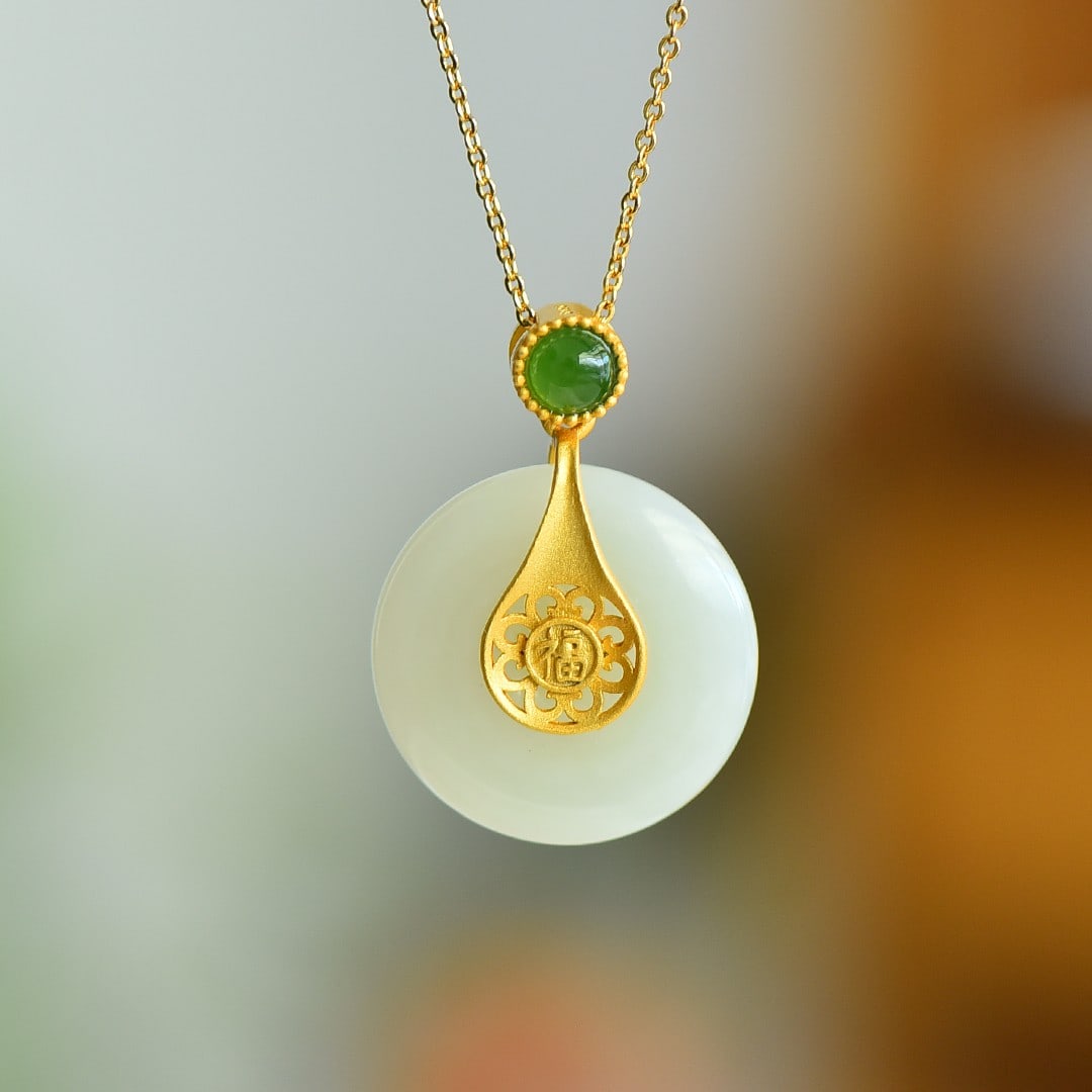An Exquisite Sterling Silver-Gold Plated Inlaid White Jade Pendant: An Exquisite Sterling Silver-Gold Plated Inlaid White Jade Pendant,Size:22mmx22mm 纯银镀金镶白玉吊坠