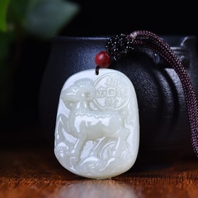 An Exquisite White Jade Sheep Pattern Pendant