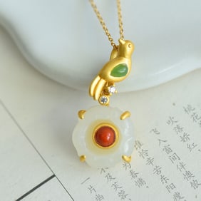 An Exquisite Sterling Silver-Gold Plated Inlaid White Jade Pendant