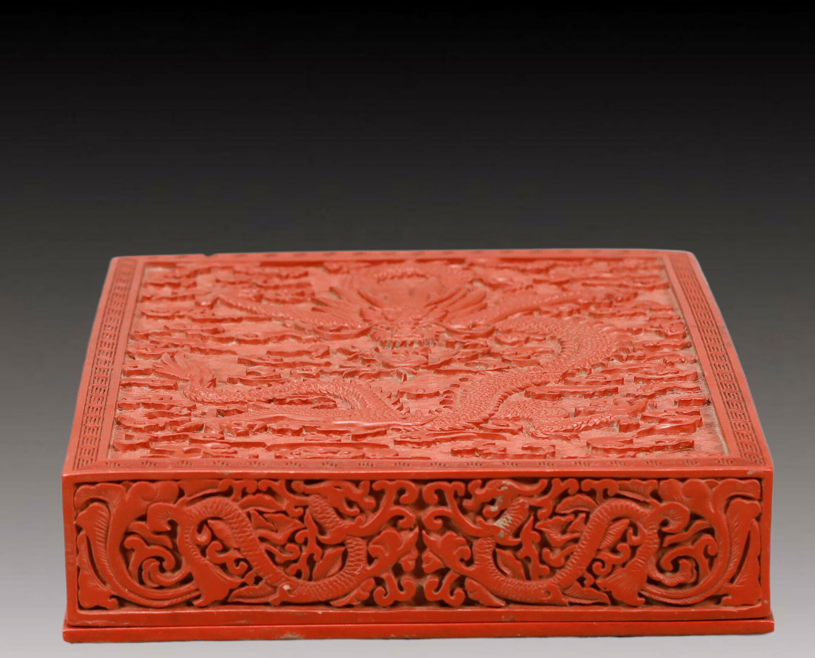A Craved Red Lacquer Auspicious Cloud and Dragon Pattern Box (1 of 12)