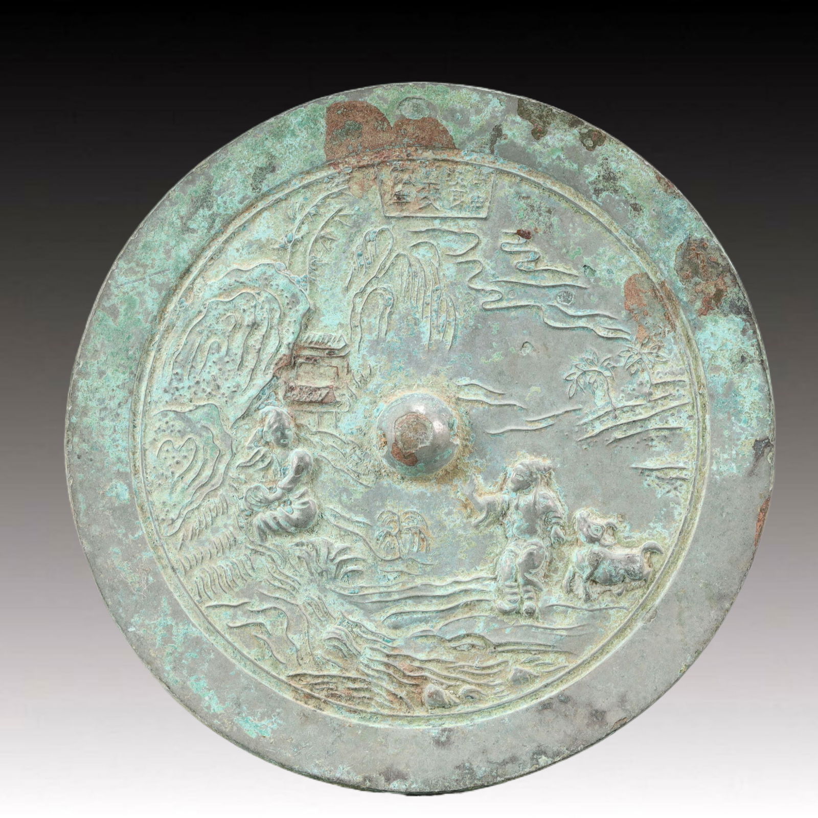 An Archaic Bronze Landscape and Figure Pattern Mirror (1 of 7)