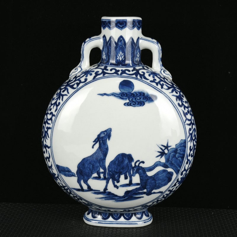 An Exquisite Blue and White Lotus and Goat Pattern Double-Ears Vase: An Exquisite Blue and White Lotus and Goat Pattern Double-Ears Vase,Song Dynasty, China,Qianlong Six-character Mark,Size:9.4inx7.1inx3.7in 青花缠枝莲羊纹Ö