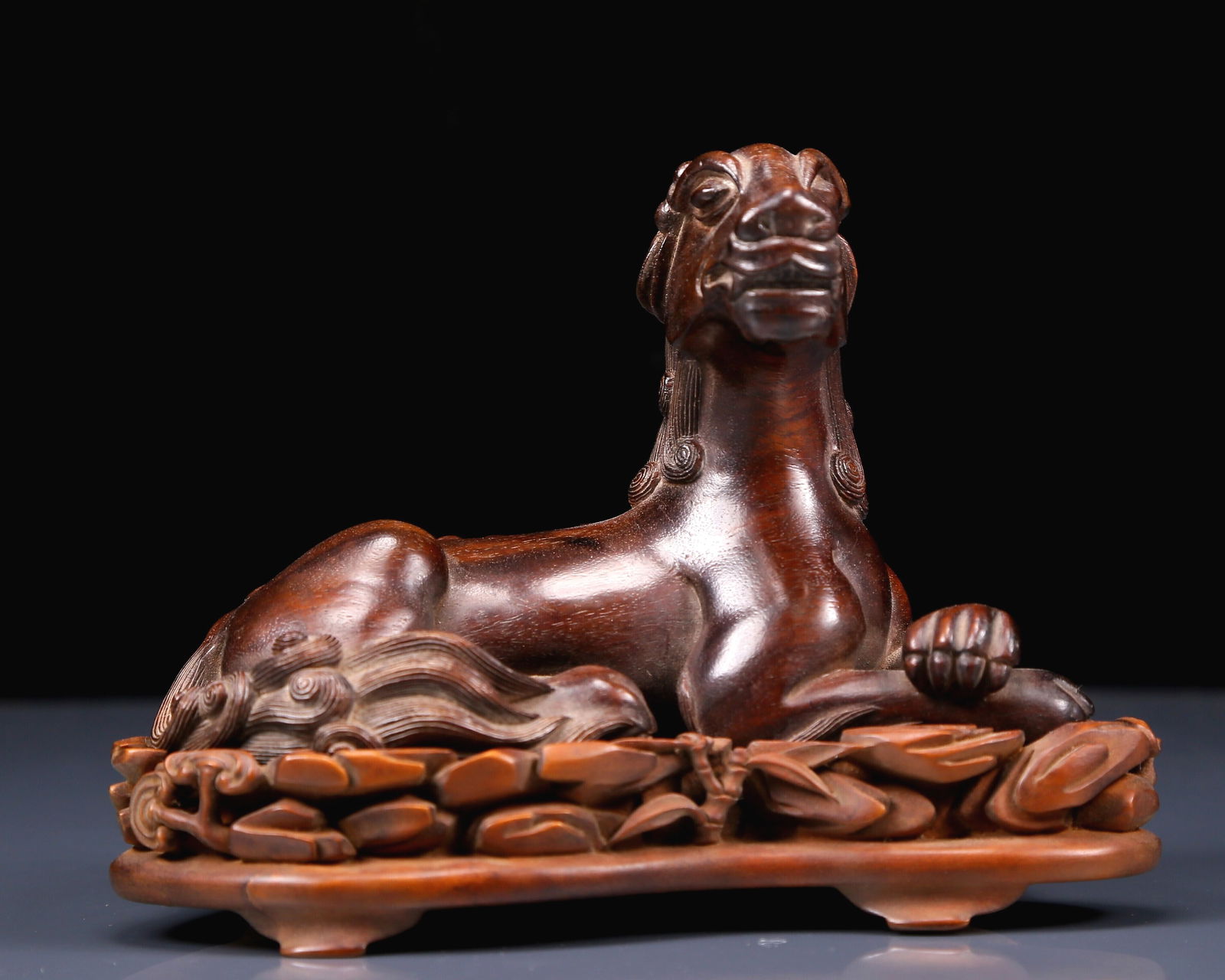 An Exquisite Huanghuali Wood Lion Ornament With Boxwood Base (1 of 9)