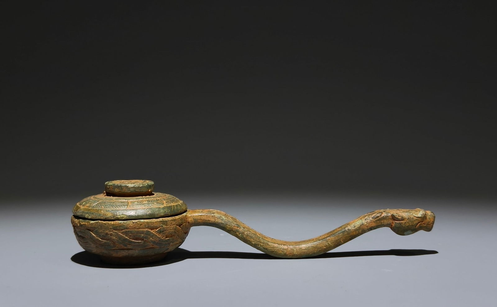 An Archaic Bronze Spoon Ornament (1 of 9)