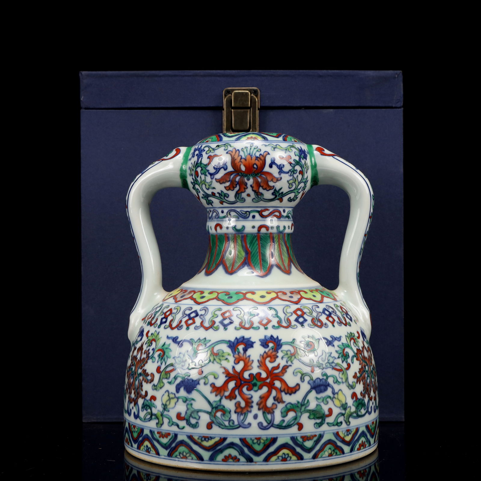 An Exquisite Famille-Rose Lotus Pattern Double-Ears Vase: An Exquisite Famille-Rose Lotus Pattern Double-Ears Vase,Qing Dynasty, China,Yongzheng Six-character Mark,Size:6.1inx6.1inx7.9in 粉彩缠枝莲纹双耳瓶