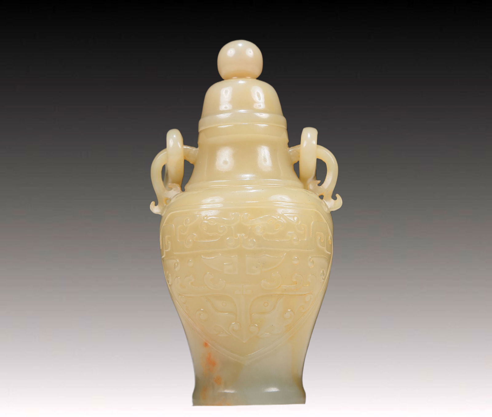 An Exquisite Yellow Jade 'Animal Mask' Vase And Cover (1 of 7)