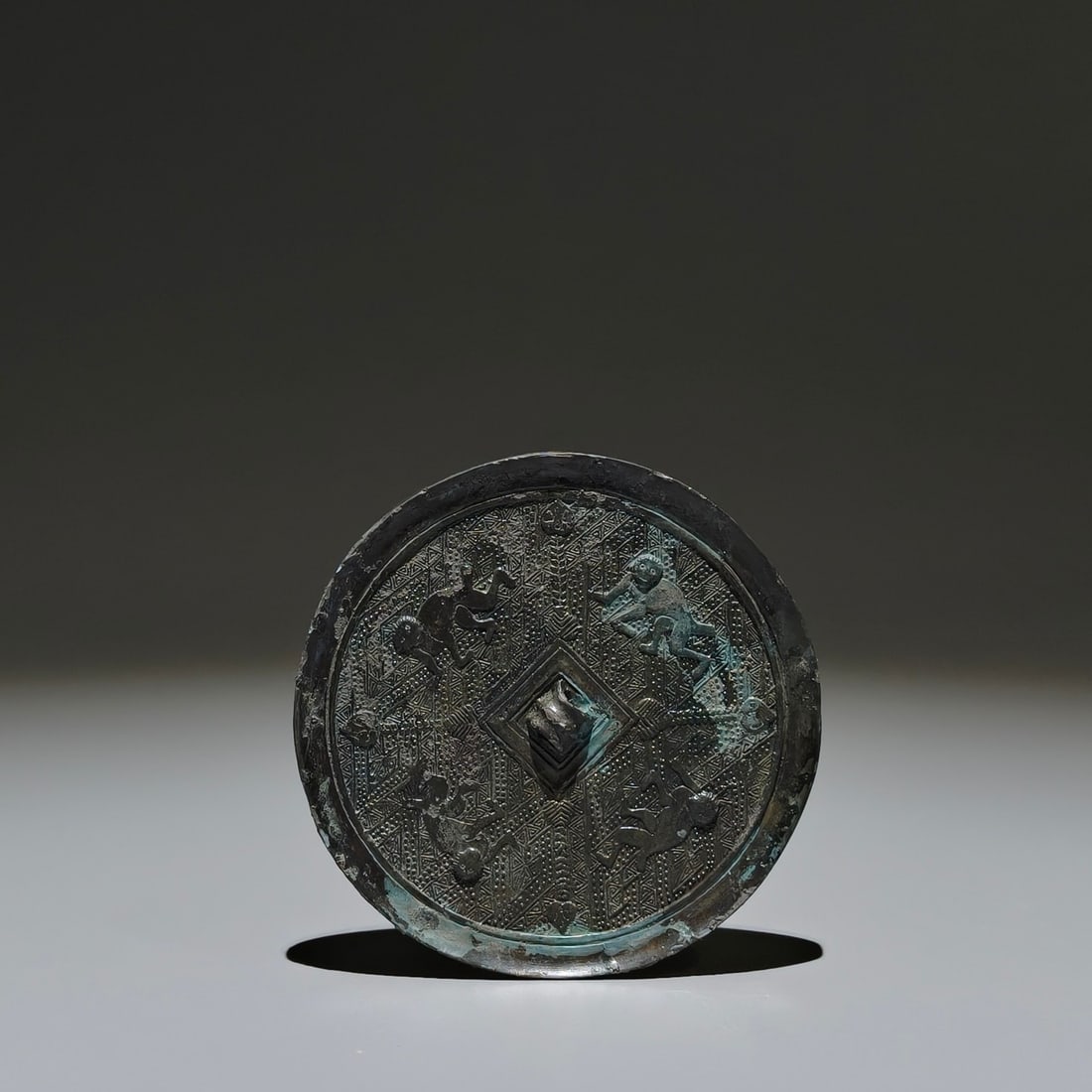 An Archaic Bronze Monkey Pattern Round Mirror (1 of 9)