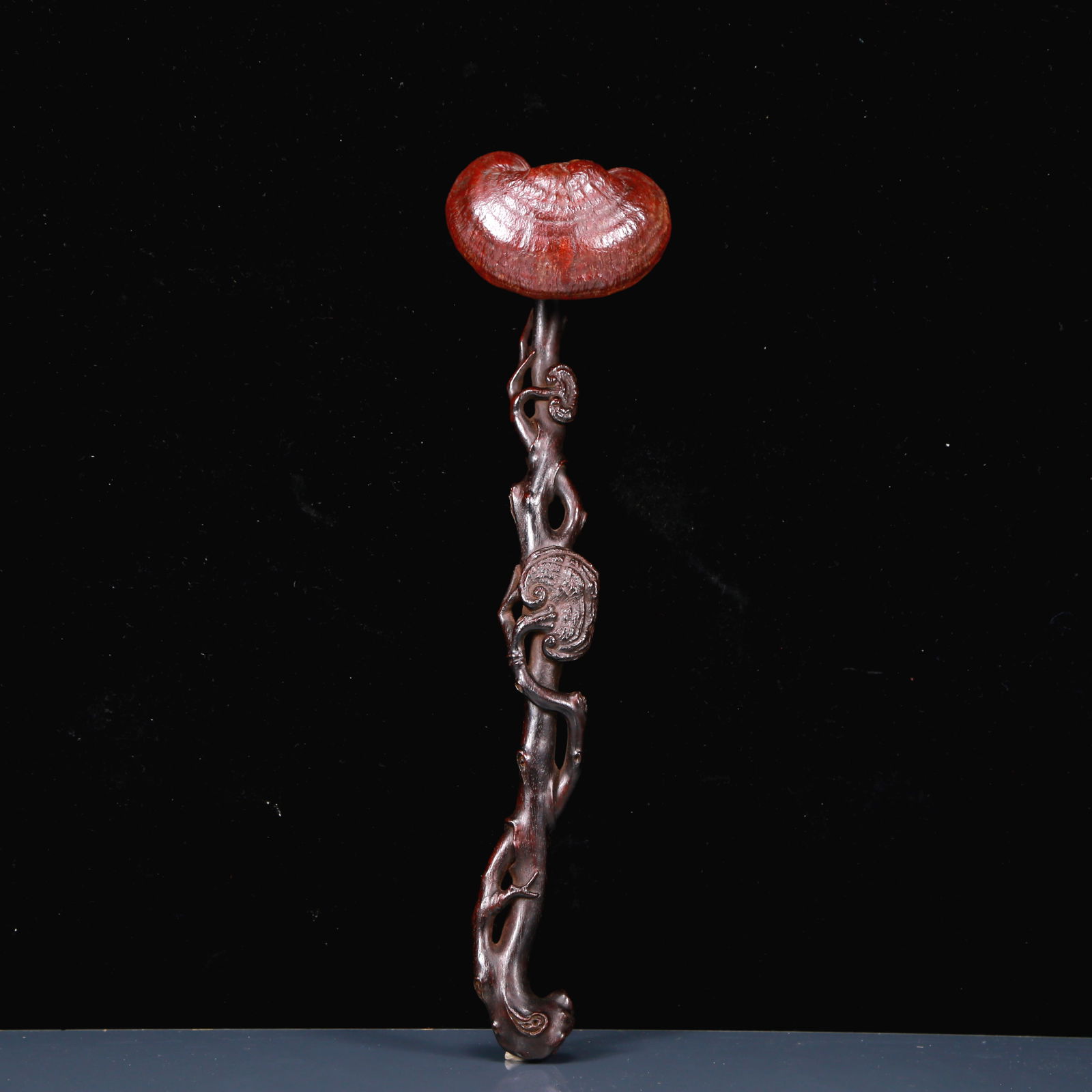 An Exquisite Zitanwood Ganoderma lucidum Pattern Ruyi: An Exquisite Zitanwood Ganoderma lucidum Pattern Ruyi,Qing Dynasty, China,Size:3inx2inx12.2in,Weight:60g 紫檀木灵芝如意，清代