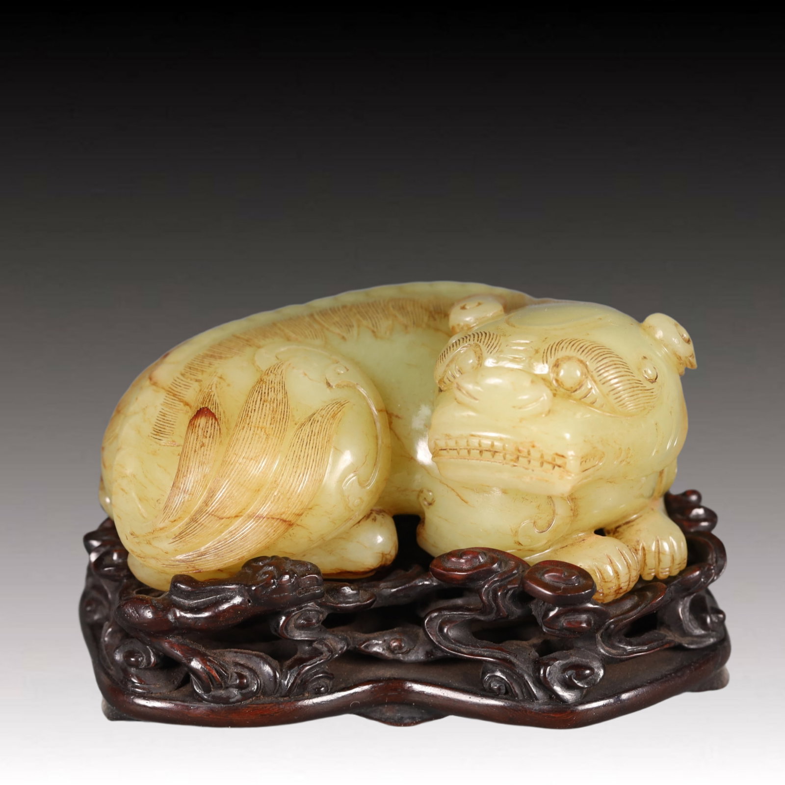 A Precious Yellow Jade Auspicious Beast Ornament (1 of 8)