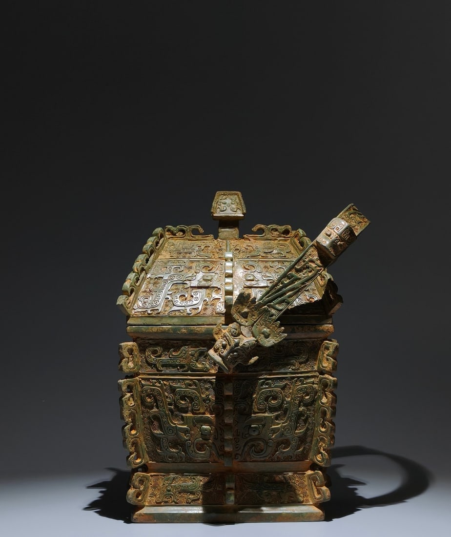 An Archaic Bronze Beast-Face Pattern Ewer,With Inscription: An Archaic Bronze Beast-Face Pattern Ewer,With Inscription,Shang Dynasty, China,Size:15.7inx9.4inx7.1in 