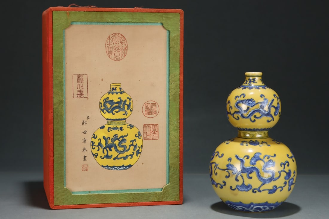 An Exquisite Yellow Ground Blue and White Seawater and Dragon Pattern Gourd-Shaped Vase: An Exquisite Yellow Ground Blue and White Seawater and Dragon Pattern Gourd-Shaped Vase,Qing Dynasty, China,Qianlong Six-character Mark,Size:8.4inx5.4in 黄地青花海水
