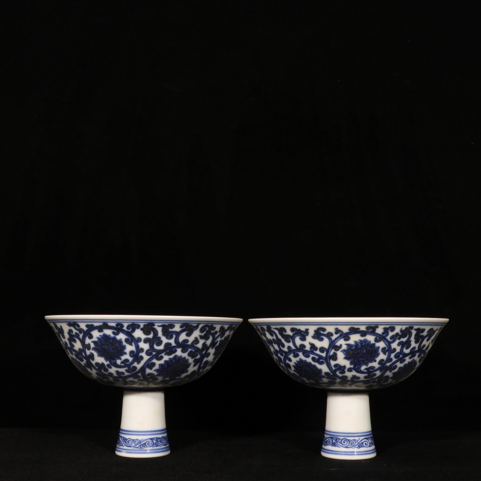 A Pair of Exquisite Blue and White Lotus Pattern Stem Bowls: A Pair of Exquisite Blue and White Lotus Pattern Stem Bowls,Ming Dynasty, China,Xuande Six-character Mark,Size:4.5inx6.5in 