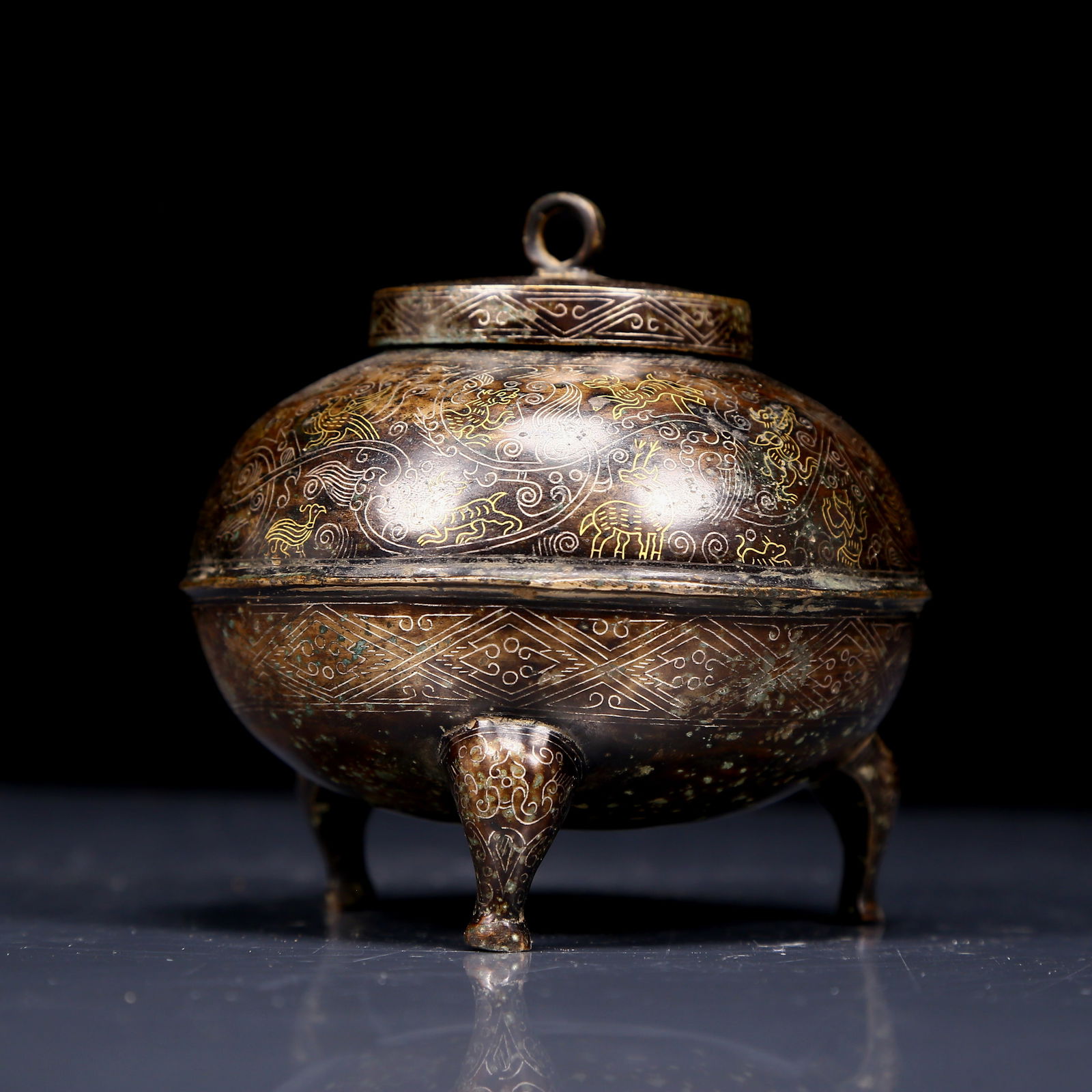 A Rare Bronze Inlaid Gold and Silver Auspicious Beast Pattern Tripod Pot: A Rare Bronze Inlaid Gold and Silver Auspicious Beast Pattern Tripod Pot,Ancient Time, China,Size:3.9inx4.1in,Weight:250g 
