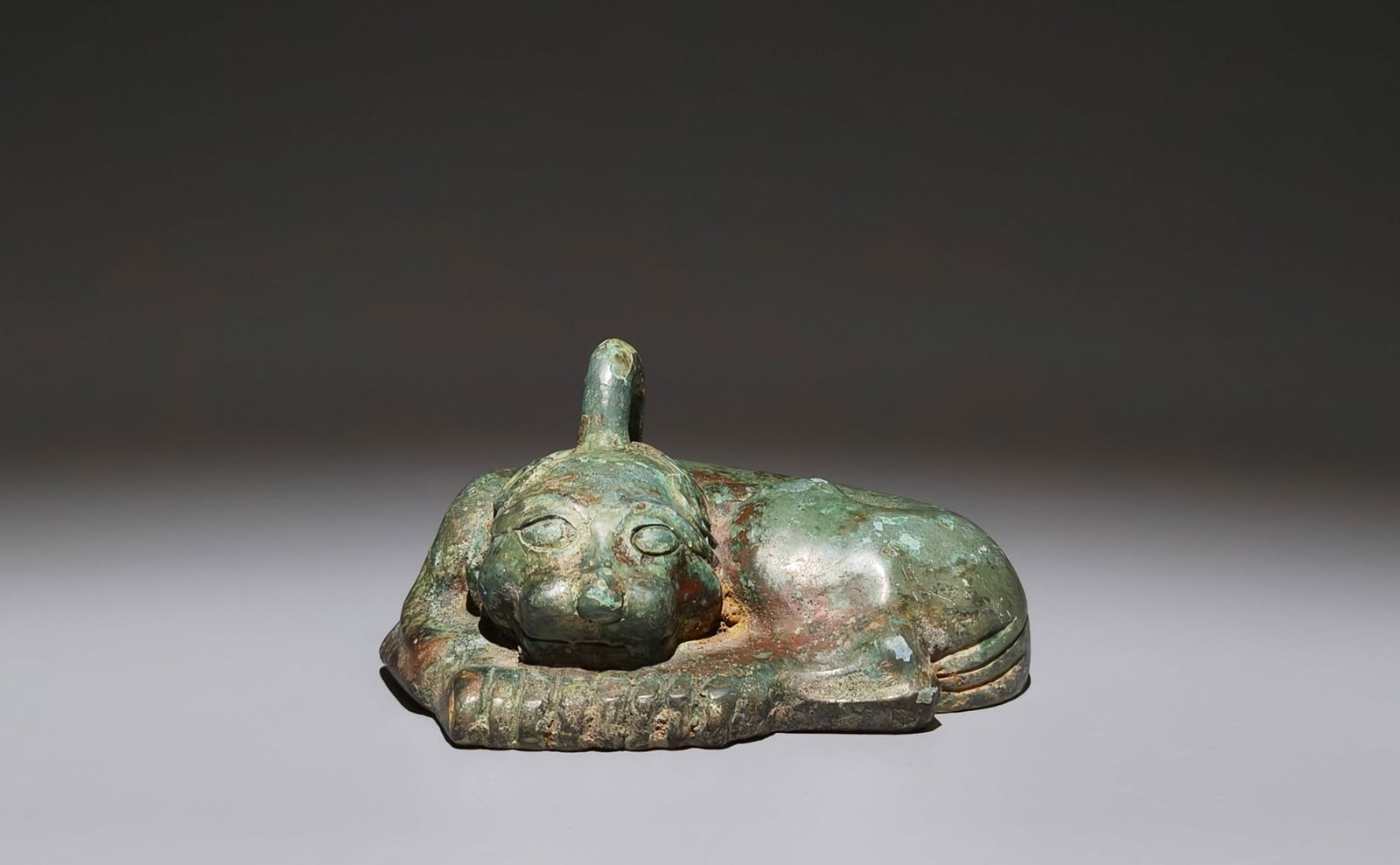 An Archaic Bronze Auspicious Beast Ornament (1 of 9)