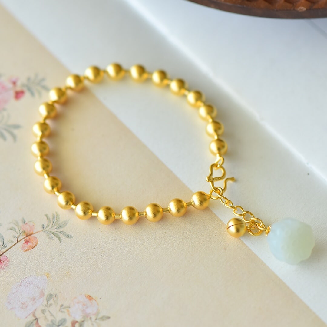 An Exquisite Sterling Silver-Gold Plated Inlaid White Jade Bracelet: An Exquisite Sterling Silver-Gold Plated Inlaid White Jade Bracelet,Size:12mmx12mm 纯银镀金镶白玉手链
