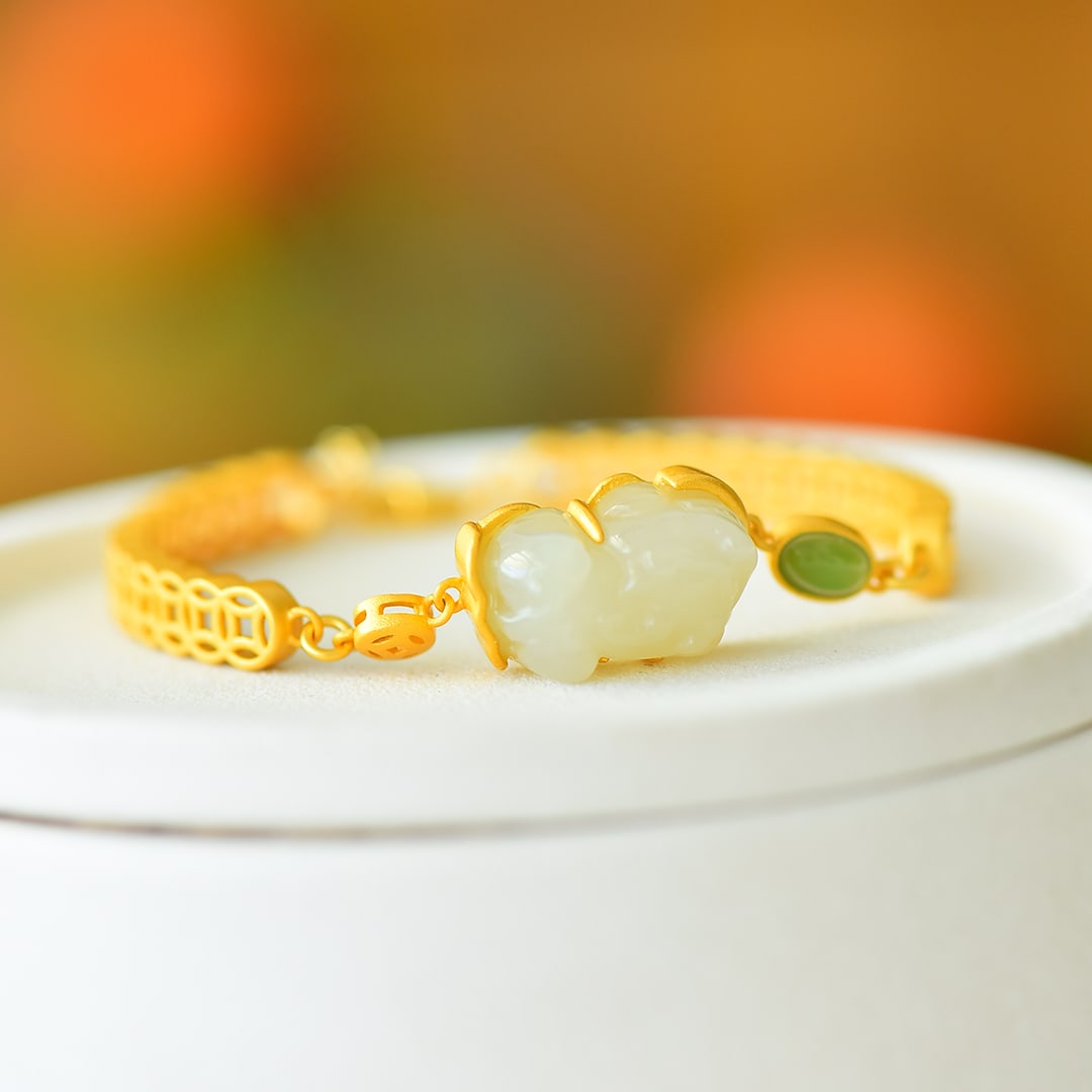An Exquisite Sterling Silver-Gold Plated Inlaid White Jade Bracelet: An Exquisite Sterling Silver-Gold Plated Inlaid White Jade Bracelet,Size:12mmx17mm 纯银镀金镶白玉手链