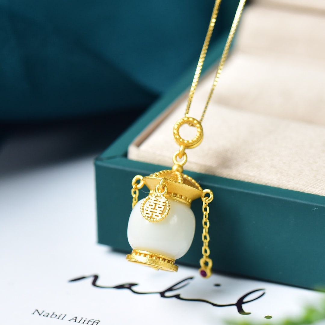 An Exquisite Sterling Silver-Gold Plated Inlaid White Jade Pendant: An Exquisite Sterling Silver-Gold Plated Inlaid White Jade Pendant 纯银镀金镶白玉吊坠