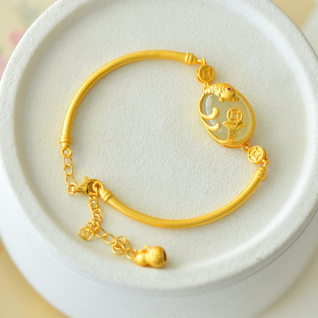 An Exquisite Sterling Silver-Gold Plated Inlaid White Jade Bracelet: An Exquisite Sterling Silver-Gold Plated Inlaid White Jade Bracelet,Size:12mmx16mm 纯银镀金镶白玉手链