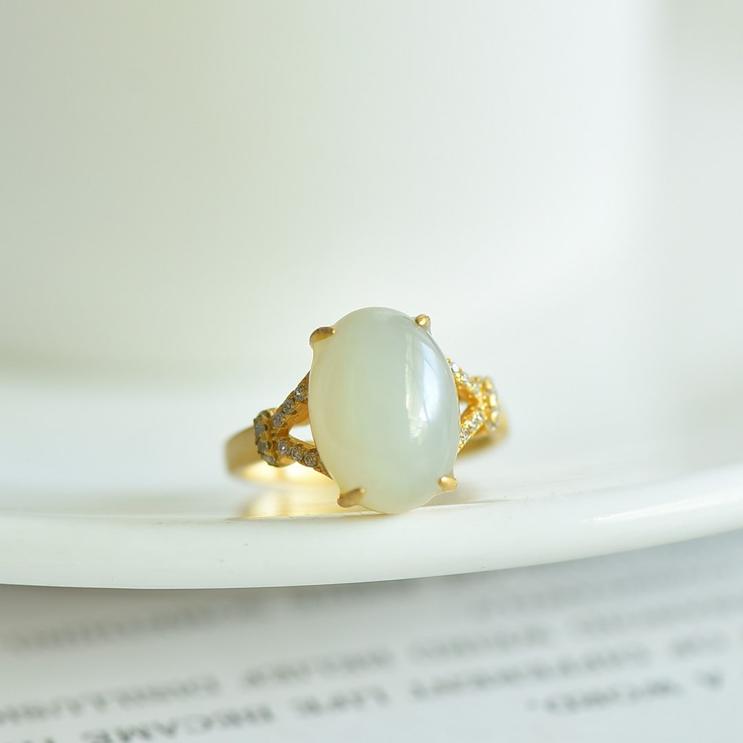 An Exquisite Sterling Silver-Gold Plated Inlaid White Jade Ring,Inlaid Diamonds: An Exquisite Sterling Silver-Gold Plated Inlaid White Jade Ring,Inlaid Diamonds,Size:10mmx14mm 纯银镀金镶白玉戒指,嵌钻石