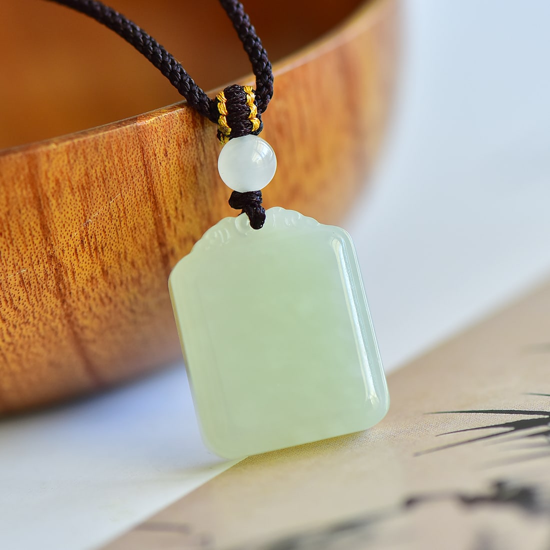 An Exquisite Greenish Jade Pendant: An Exquisite Greenish Jade Pendant,Size:25mmx20mmx8mm 寓意:保佑平安吉祥 事事顺利 青白玉吊坠