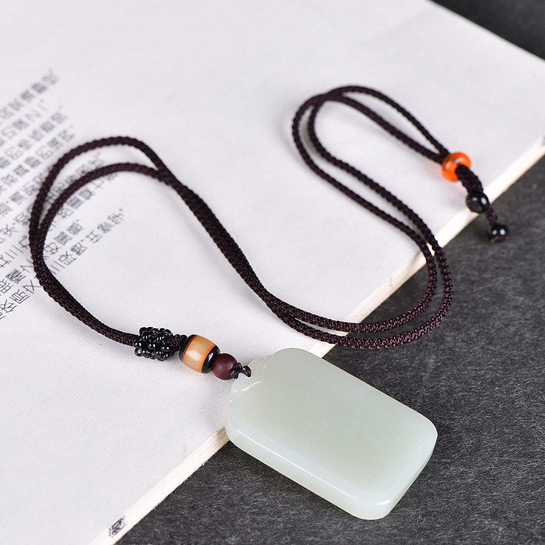 An Exquisite White Jade Pendant: An Exquisite White Jade Pendant,Size:31mmx47mm 寓意:吉祥 平平安安 白玉吊坠