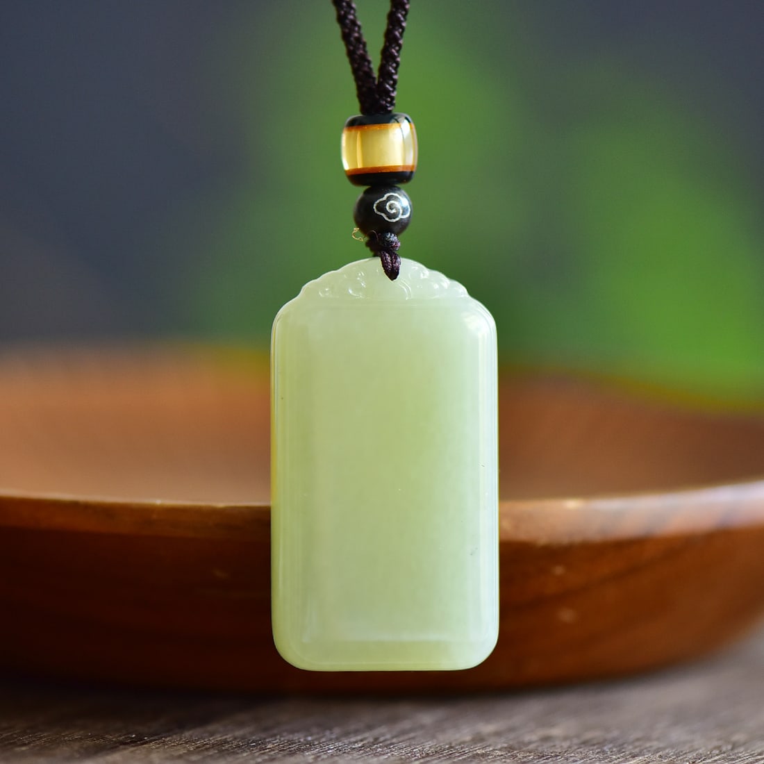 An Exquisite Greenish Jade Pendant (1 of 5)